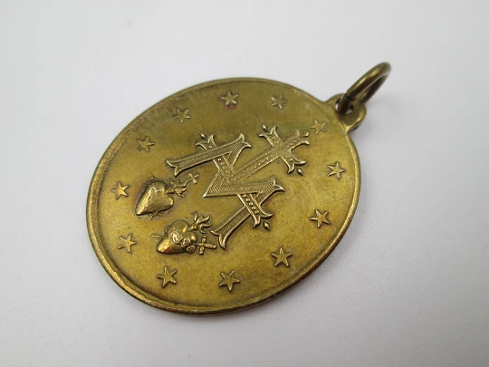 Medalla de bronce Inmaculada Concepción. Anagrama de María. Asa y argolla. 1900
