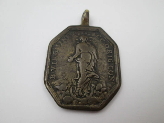 Medalla de bronce. Inmaculada Concepción y Santísimo Sacramento. Octogonal. Siglo XVIII