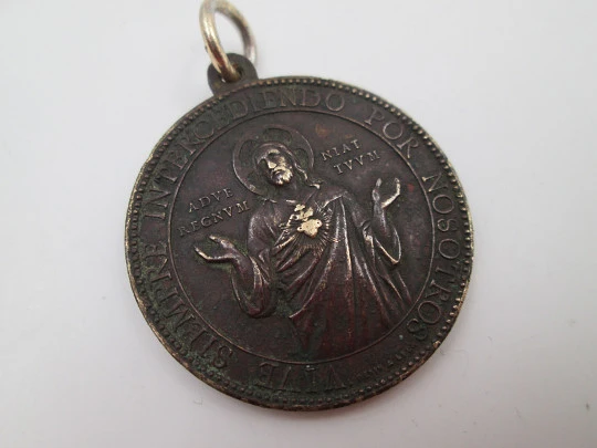 Medalla de bronce. Sagrado Corazón de Jesús. Ludovic Penin. Asa y argolla. 1880. Europa