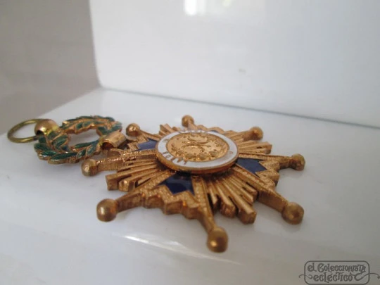 Medalla Mérito Escolar. Años 50. Metal dorado y esmalte. España