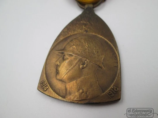 Medalla Primera Guerra Mundial. Bronce. Bélgica. 1919. Banda tela