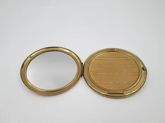 Melissa powder compact. Gold plated and mother-of-pearl ornaments. England. 1950's