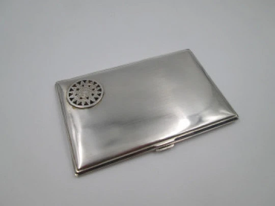 Men's rectangular cigarette case. Sterling silver and Sun's stone motif. Mexico. 1980's