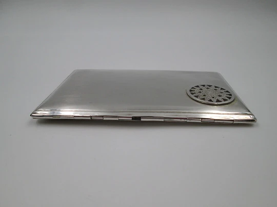 Men's rectangular cigarette case. Sterling silver and Sun's stone motif. Mexico. 1980's