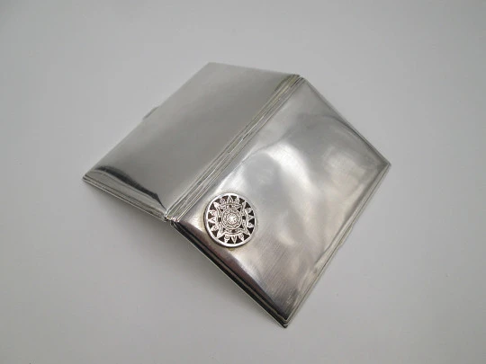 Men's rectangular cigarette case. Sterling silver and Sun's stone motif. Mexico. 1980's