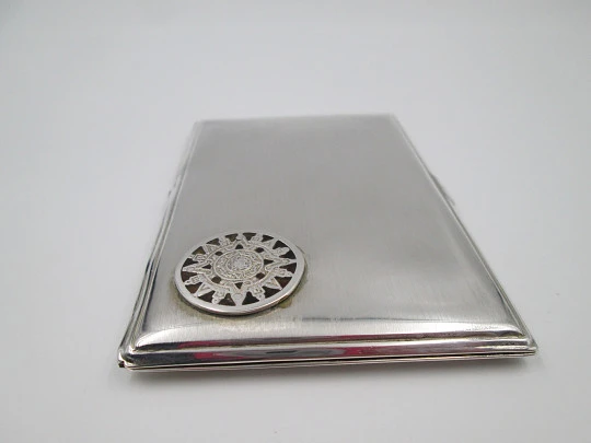 Men's rectangular cigarette case. Sterling silver and Sun's stone motif. Mexico. 1980's