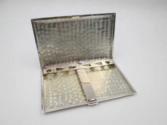 Men's rectangular cigarette case. Sterling silver and Sun's stone motif. Mexico. 1980's