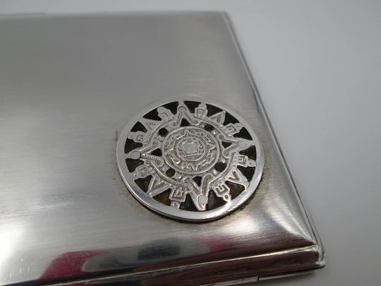 Men's rectangular cigarette case. Sterling silver and Sun's stone motif. Mexico. 1980's