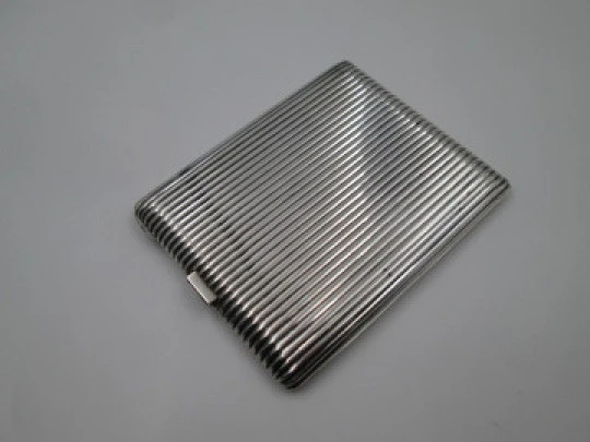 Men's rectangular cigarette case. Sterling silver. Sapphires clasp. Ribbed design. 1950's