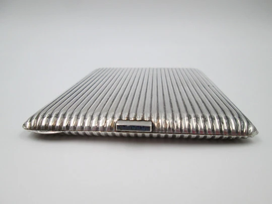 Men's rectangular cigarette case. Sterling silver. Sapphires clasp. Ribbed design. 1950's