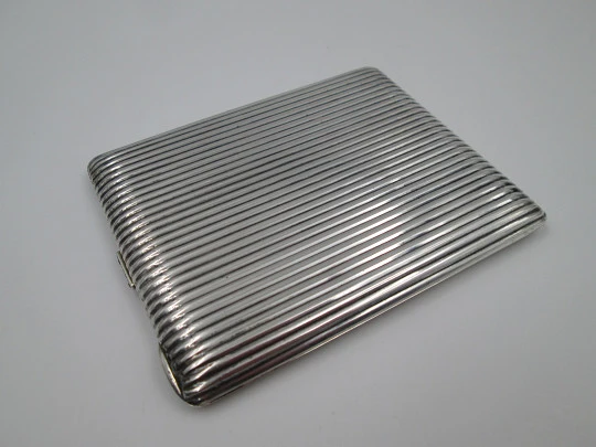 Men's rectangular cigarette case. Sterling silver. Sapphires clasp. Ribbed design. 1950's