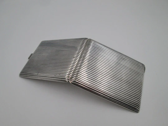 Men's rectangular cigarette case. Sterling silver. Sapphires clasp. Ribbed design. 1950's