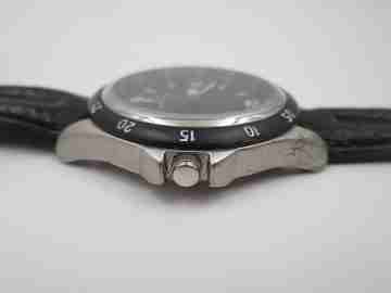 Men's sport watch. Metal and steel. Black bezel. Quartz. Japan. 2000's
