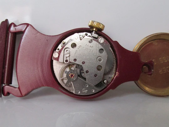 Mentor pendant / desk clock. Gold plated & enamel. Pendulum view