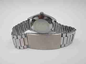 Milus. Acero inoxidable. Automático. Brazalete. Calendario. Bisel estriado. 1970