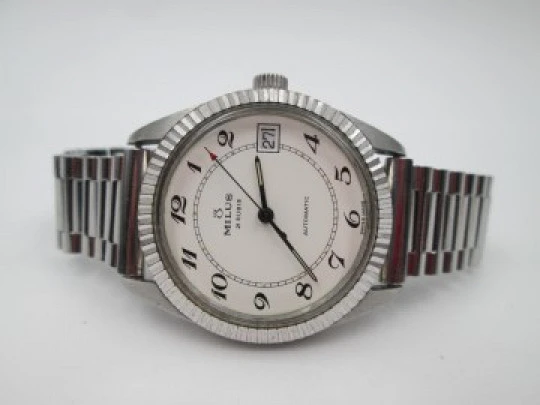 Milus. Stainless steel. Automatic. Calendar. Bracelet. Fluted bezel. 1970's