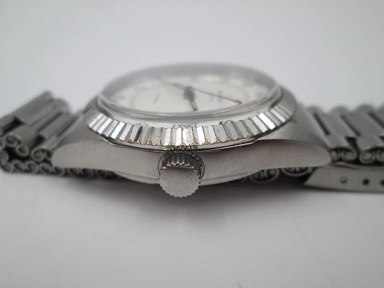 Milus. Stainless steel. Automatic. Calendar. Bracelet. Fluted bezel. 1970's