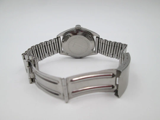 Milus. Stainless steel. Automatic. Calendar. Bracelet. Fluted bezel. 1970's