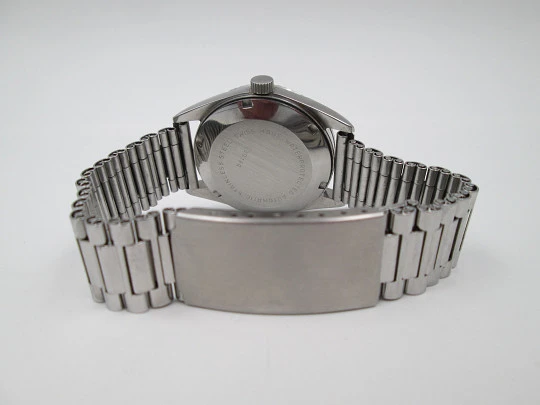 Milus. Stainless steel. Automatic. Calendar. Bracelet. Fluted bezel. 1970's