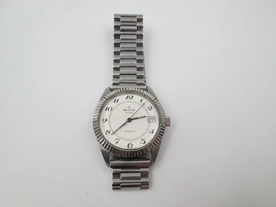 Milus. Stainless steel. Automatic. Calendar. Bracelet. Fluted bezel. 1970's