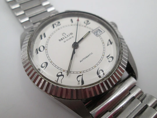 Milus. Stainless steel. Automatic. Calendar. Bracelet. Fluted bezel. 1970's