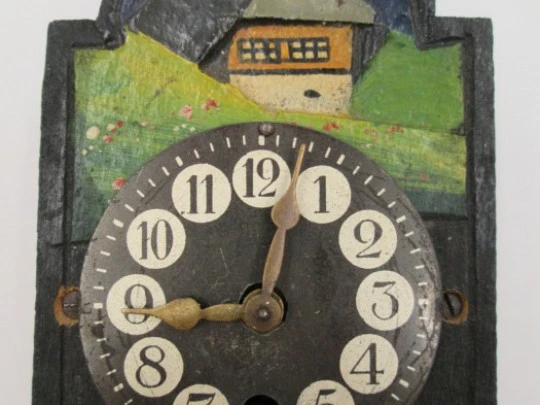 Miniature wall clock. Gold plated and polychromed wood. 1940's