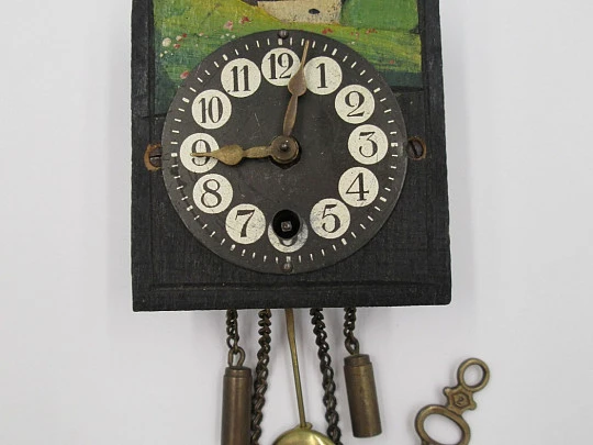 Miniature wall clock. Gold plated and polychromed wood. 1940's