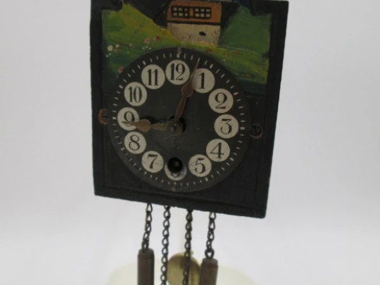 Miniature wall clock. Gold plated and polychromed wood. 1940's