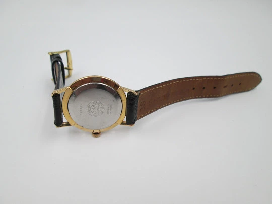 Moeris. Manual wind. 1960's. Steel & gold plated. Swiss. Leather strap