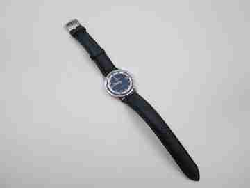 Mondia Graduate. Cuerda manual. Acero y metal cromado. Dial bicolor. Calendario