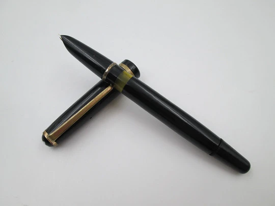 Montblanc 630. Black celluloid and gold plated details. Piston filler. 1950's