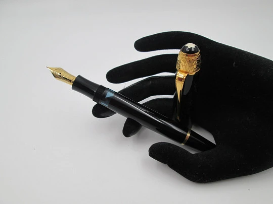 Montblanc Voltaire fountain pen. Black resin and vermeil sterling silver details. 1995 Montblanc Voltaire fountain pen. Black resin and vermeil sterling silver details. 1995