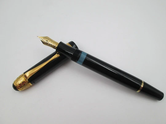 Montblanc Voltaire fountain pen. Black resin and vermeil sterling silver details. 1995 Montblanc Voltaire fountain pen. Black resin and vermeil sterling silver details. 1995
