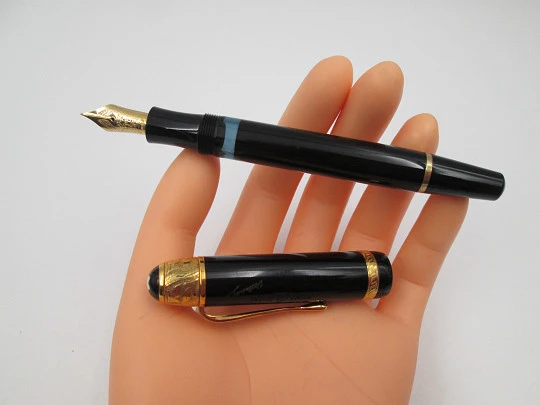 Montblanc Voltaire fountain pen. Black resin and vermeil sterling silver details. 1995 Montblanc Voltaire fountain pen. Black resin and vermeil sterling silver details. 1995