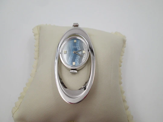 Mortima pendant watch. Silver plated metal. Bitone dial. Elliptical shape. France. 1970's