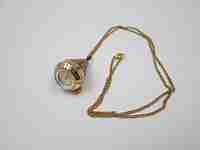 Mortima women's conical pendant watch. Gold plated & red enamel. Manual wind
