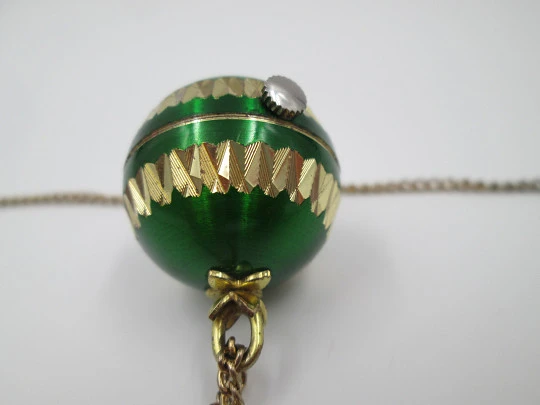 Mortima women's pendant watch. Gold plated and green enamel. Ball shape. 1970's