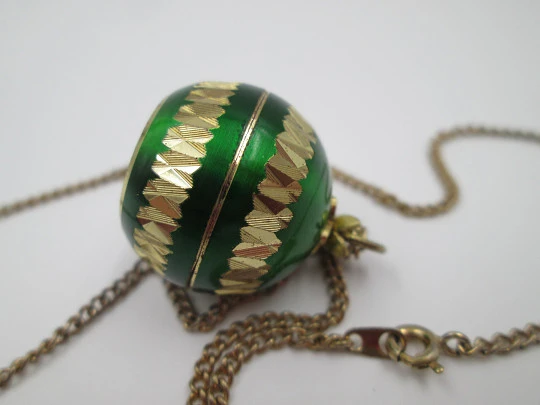 Mortima women's pendant watch. Gold plated and green enamel. Ball shape. 1970's