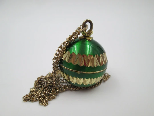 Mortima women's pendant watch. Gold plated and green enamel. Ball shape. 1970's