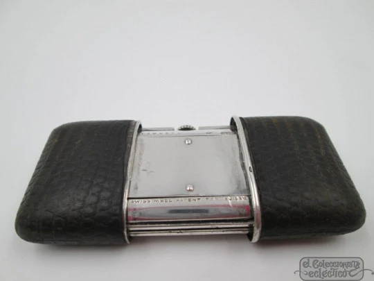 Movado Carassale travel watch. Sterling silver and snake skin. Automatic. Swiss. 1940's