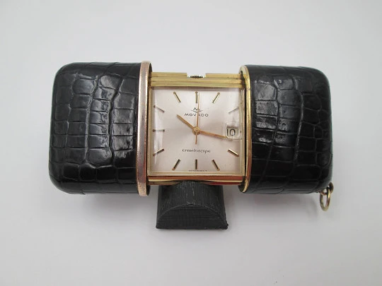 Movado Ermetoscope travel watch. Gold plated metal and crocodile skin. Calendar. 1950's