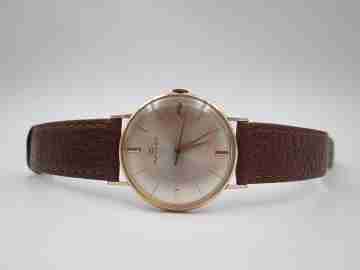 Movado. Acero y chapado oro 20 micras. Cuerda manual. Segundero. 1960