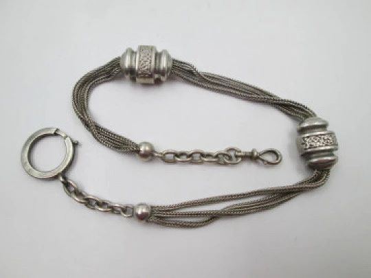 Multi-thread chatelaine. Sterling silver. Two sliding pieces & lobster clasp. 1910's. Europe