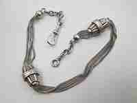 Multi-thread chatelaine. Sterling silver. Two sliding pieces & lobster clasp. 1930's