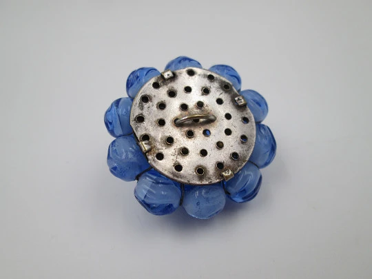 Murano glass circular button. Silver-plated metal and bitone blue beads. Europe. 1960's