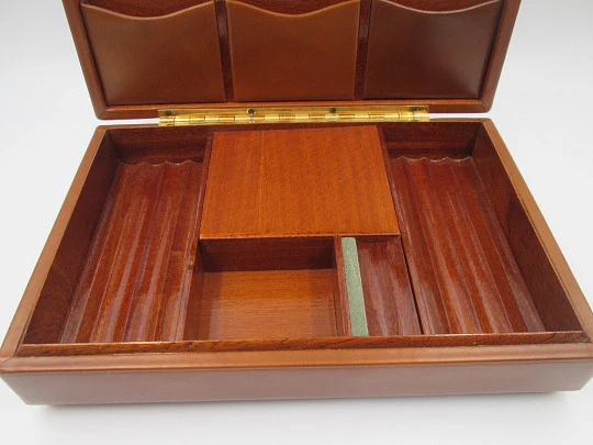 Musical tobacco table desk box. Wood and brown leather. Manual wind. Europe. 1970's Musical tobacco table desk box. Wood and brown leather. Manual wind. Europe. 1970's