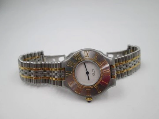 Must de Cartier 21 mujer. Acero inoxidable y detalles oro. Cuarzo. Brazalete. 1990