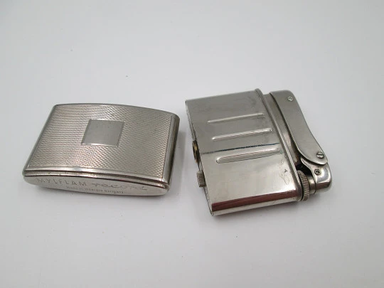 Mylflam Record pocket gas lighter. Silver plated metal. Linear pattern. West Germany