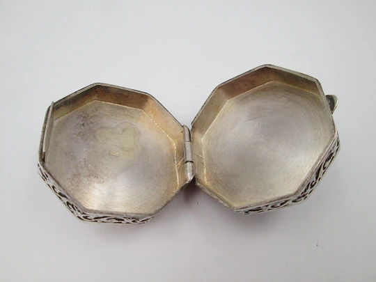 Octagonal pillbox. Sterling silver. Checkered mother-of-pearl front. Vegetable ornates