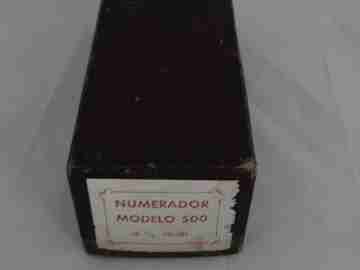Office Numerator. El Casco. 1960's. Box. Silver metal. Wood handle